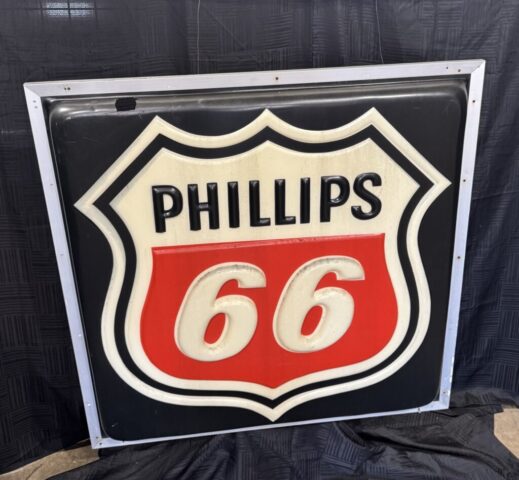 Vintage Phillips 66 oil and gas advertising sign with shield logo