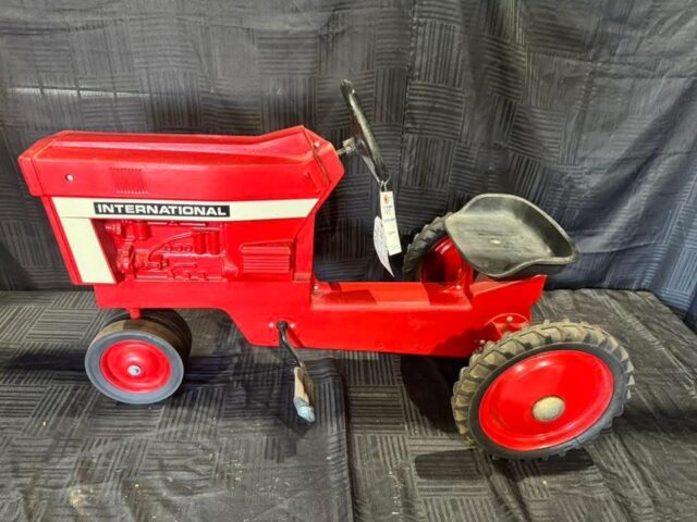 Antique International collectible pedal tractor