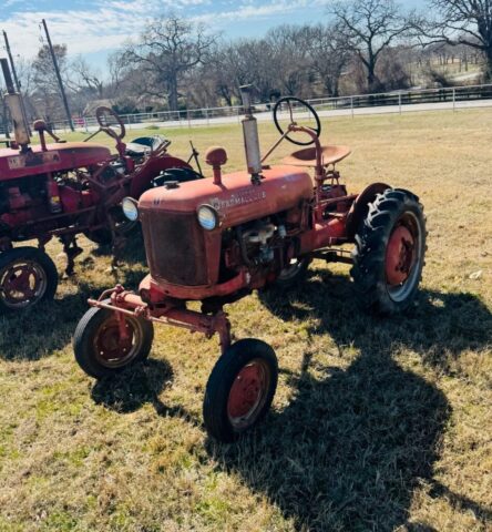 Antique International Harvester Farmall Cub tractor in public farm auction offered by Kiefer Auctioneers in Texas