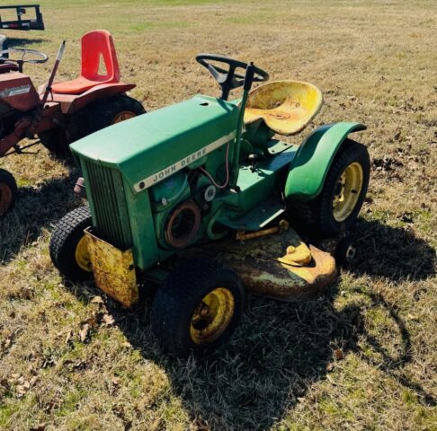 Antique John Deere 110 Round Fender lawn and garden tractor in public farm auction offered by Kiefer Auctioneers in Texas