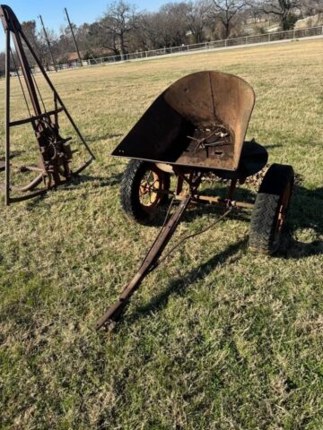 Antique farm equipment for sale in public auction offered by Kiefer Auctioneers in Texas