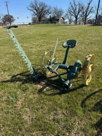 John Deere antique sickle bar mower for sale in public auction offered by Kiefer Auctioneers in Texas