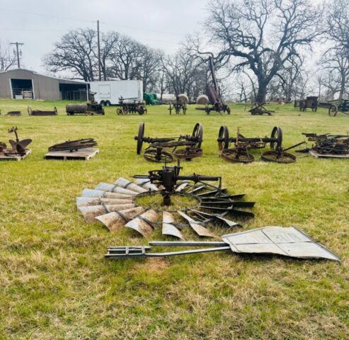 Antique farm equipment for sale in public farm auction offered by Kiefer Auctioneers in Texas