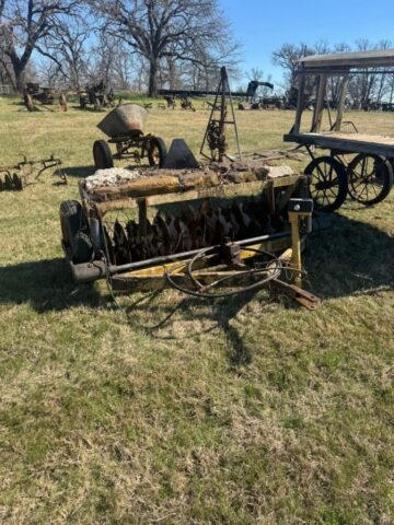Antique grain drill for sale in public auction offered by Kiefer Auctioneers in Texas