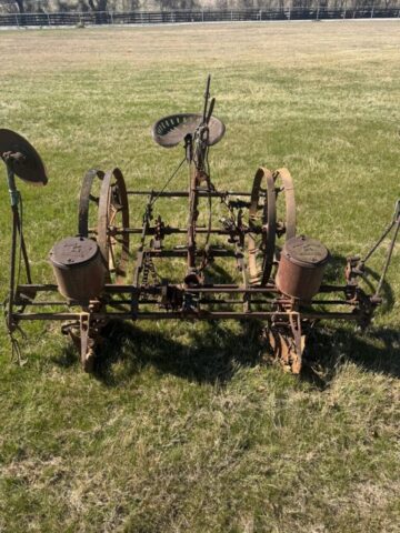 Antique horse-drawn corn planter in public auction offered by Kiefer Auctioneers in Texas