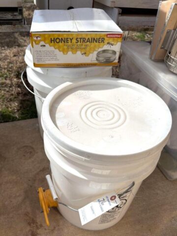 Beekeeping Honey Buckets and Honey Strainer for sale in online auction offered by Kiefer Auctioneers in Texas