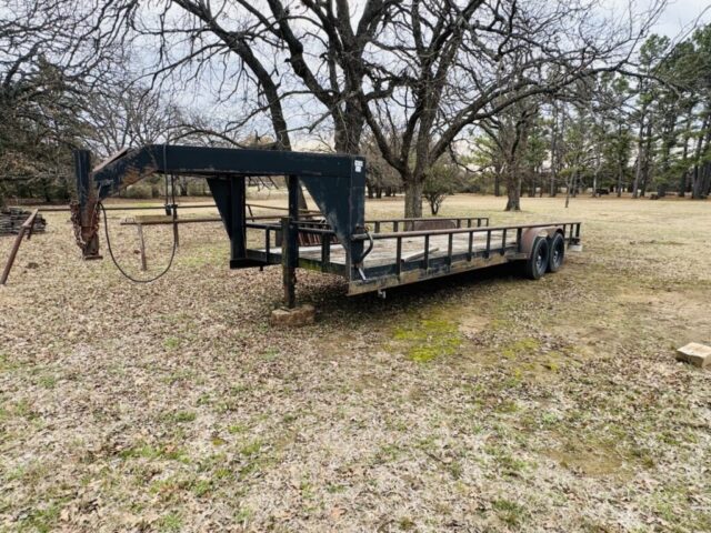 Texas Bragg Gooseneck Trailer in online auction offered by Kiefer Auctioneers in Texas