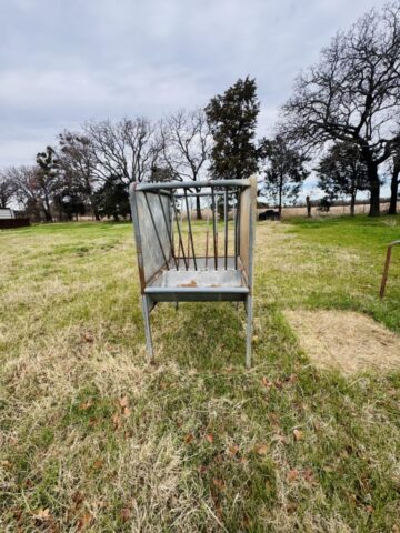 Livestock feeder in online farm auction offered by Kiefer Auctioneers in Texas