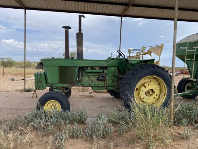 John Deere tractor in public auction offered by Kiefer Auctioneers in West Texas