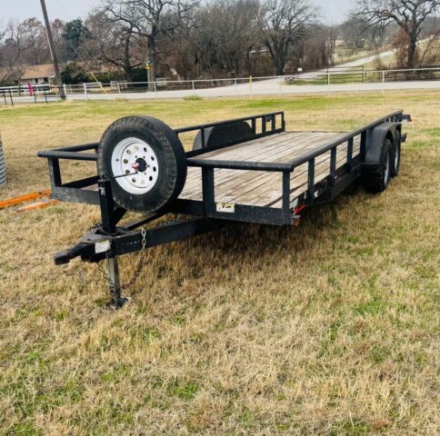Utility trailer for sale in public farm auction offered by Kiefer Auctioneers in Texas