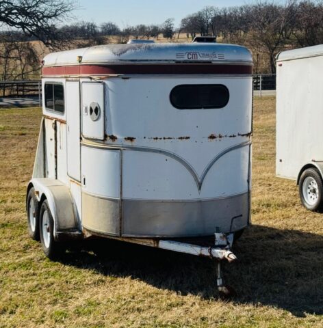 used CM 2-horse bumper pull horse trailer in public farm auction offered by Kiefer Auctioneers in Texas