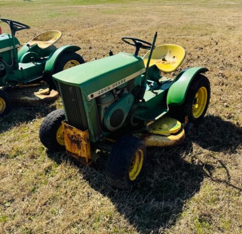 vintage John Deere 110 round fender garden tractor in public farm auction offered by Kiefer Auctioneers in Texas
