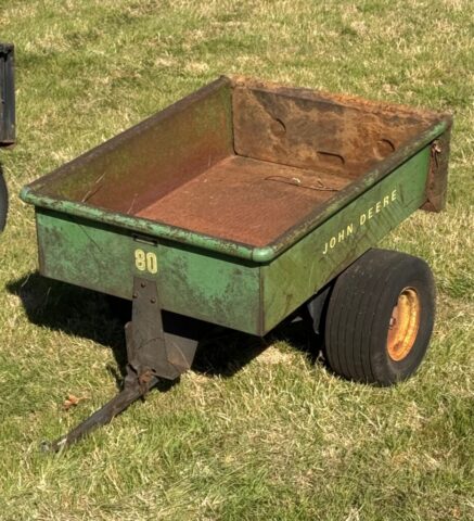 vintage John Deere 80 dump cart in public farm auction offered by Kiefer Auctioneers in Texas