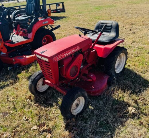 vintage Wheel Horse 857 lawn and garden tractor in public farm auction offered by Kiefer Auctioneers in Texas
