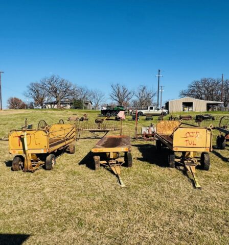 vintage farm equipment wagons in public farm auction offered by Kiefer Auctioneers in Texas