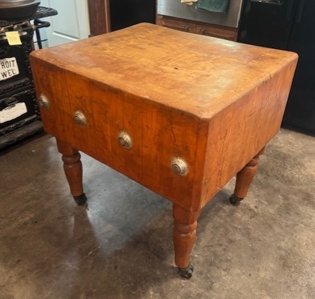 Antique solid maple butcher chopping block in upcoming online auction offered by Kiefer Auctioneers in Texas