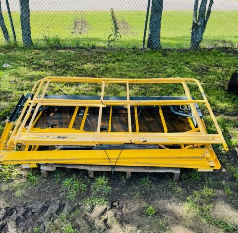 Bale accumulator in upcoming public auction offered by Kiefer Auctioneers in Texas