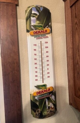 Collectible Dekalb advertising thermometer in upcoming online auction offered by Kiefer Auctioneers in Texas