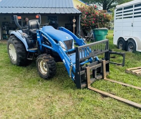New Holland tractor for sale in upcoming public auction offered by Kiefer Auctioneers in Texas