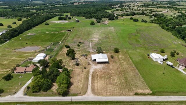 Real estate auction in Decatur Texas featuring 10 acres of land with shop, water well, and auction bidding opportunity.