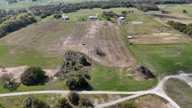 North Texas land auction in Decatur Texas offering 10 acres with shop, water well, and country property potential.
