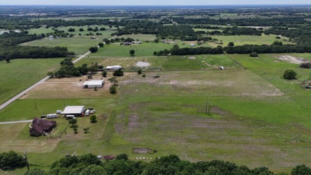 North Texas acreage auction featuring Decatur TX property with 10 acres, shop, water well, and country land setting.