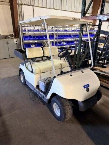 Golf cart with rear utility box for sale in upcoming public auction offered by Kiefer Auctioneers in Texas