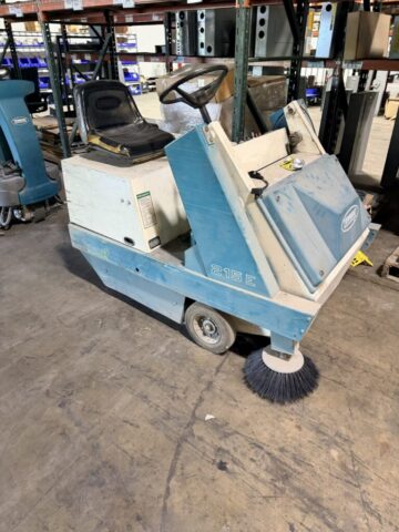 Tennant 215E electric ride-on sweeper for sale in upcoming public auction offered by Kiefer Auctioneers in Texas